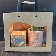 Cacao and vanilla candle and Sansevieria plant collection